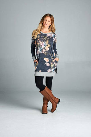 Floral tiara knit tunic top featuring solid contrast. Hidden pocket